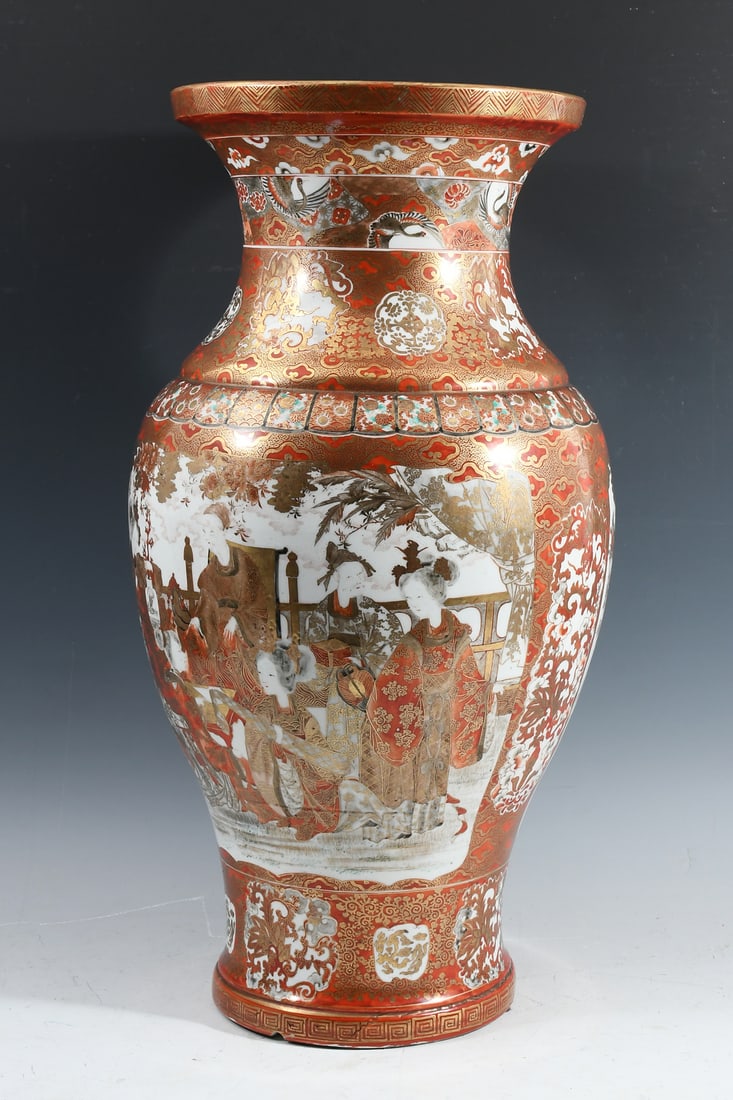 LARGE BALUSTER FORM JAPANESE KUTANI PORCELAIN VASE: LARGE BALUSTER FORM JAPANESE KUTANI PORCELAIN VASE: Elegant Japanese Kutani porcelain vase measuring 22" in height, featuring red-gold geometric decorations with cranes and peacocks.