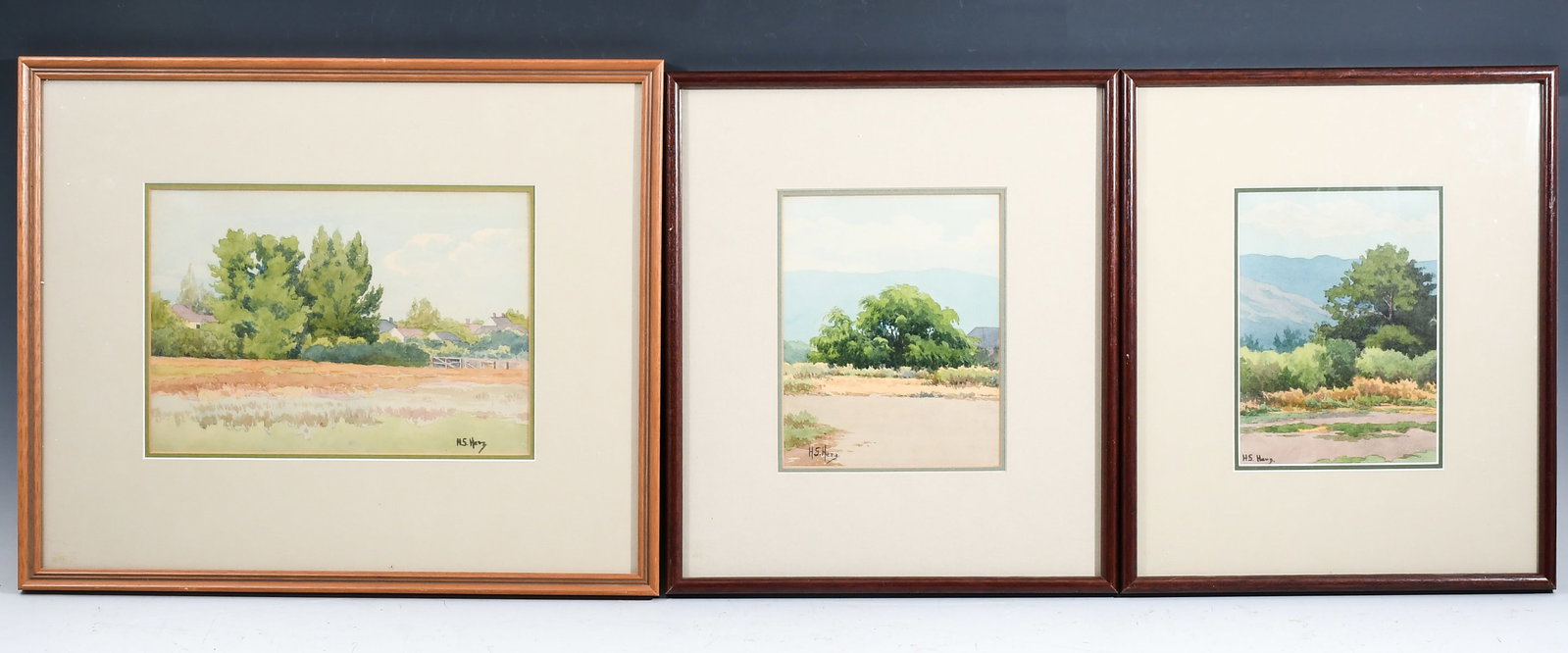 THREE HILDEGARD HERZ WATERCOLOR PAINTINGS: HERZ, Hildegard, (American, 1894-1979): Three Watercolor Landscapes: 1) Landscape with Trees, Fences, and Distant Houses, sight size 6.625" x 9.75", signed lower right, framed, 13.5" x 16.5", informat