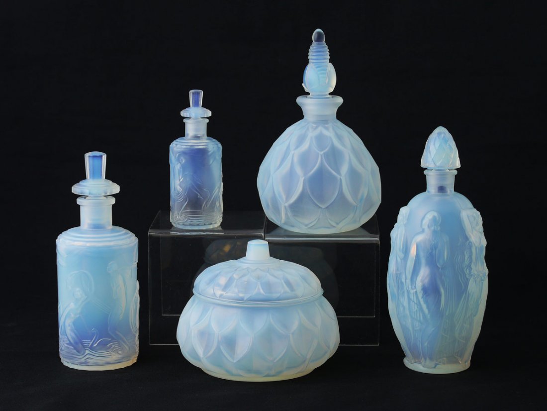 5 PIECE SABINO ART GLASS: 5 PIECE GROUP OF SABINO ART GLASS: 5 pieces total to include 1) Scent bottle featuring nudes, 6" h. 2-3) Taller and smaller scent bottles featuring dancers, 5 3/8" h. & 3 5/8" h. 4-5) Scent bottle wit