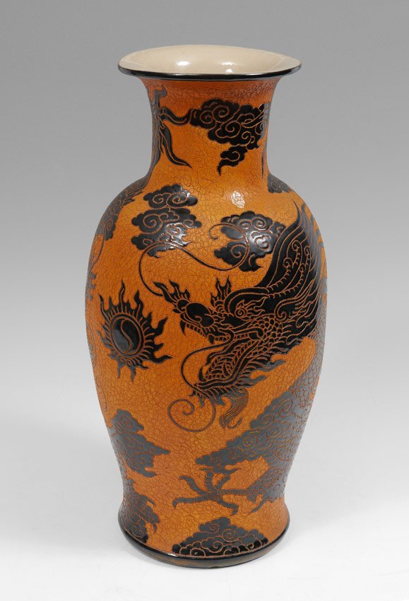 DONA VIETNAMESE EARTHENWARE DRAGON VASE: DONA VIETNAMESE EARTHENWARE DRAGON VASE: Incised body with dragon motif. Marked on base Vietnam Dona, Art Export Saigon. 22 3/4" h. x 10 3/4".