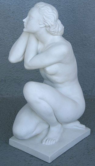 SEVRES PARIAN KNEELING NUDE AFTER TRAVERSE: PARIAN SCULPTURE AFTER PIERRE TRAVERSE, FRENCH 1892-1979: Depicts a kneeling female nude, 12" h, impressed signature and incised mark verso Sevres.