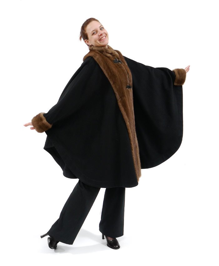 VINTAGE CASHMERE CAPE WITH MINK: FULL LENGTH CASHMERE WOOL CAPE WITH MINK TRIM: Mink collar and cuffs on black wool, frog closures, generous proportion. MeasureS approx. 40" length collar to hem.