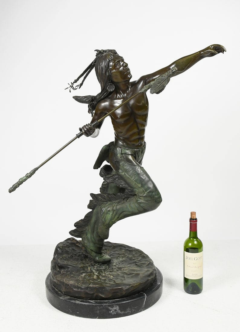LARGE BOB MCKAY JR."INDIAN WITH SPEAR" BRONZE: MCKAY, Bob Jr., (American, 20th Century):"Indian with Spear", Native American warrior mid-toss, Patinated bronze, measures 37" in height, overall 39.5" in height with rounded marble base, incised sign