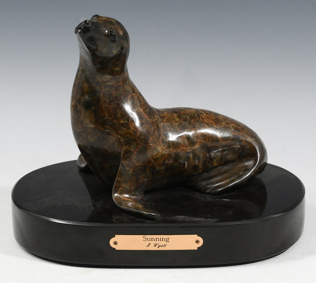 J. WYATT "SUNNING" SEAL BRONZE: WYATT, J., (American, 20th Century): "Sunning", Bronze with Distinct Spotted Patination, measures 6.5" in height, overall 8" in height with polished marble base, affixed placard with title, numbered 2