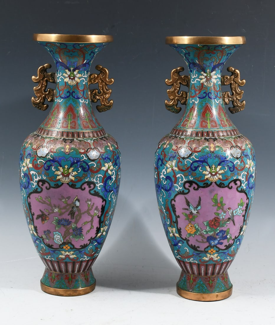 PR. CHINESE LATE QING DYNASTY CLOISONNE VASES: PR. CHINESE LATE QING DYNASTY CLOISONNE VASES: Chinese Cloisonne on Gilt Copper, Baluster form vases, having Lotus and scrolled foliate on a blue ground. Fuchsia enameled windows with various flying &