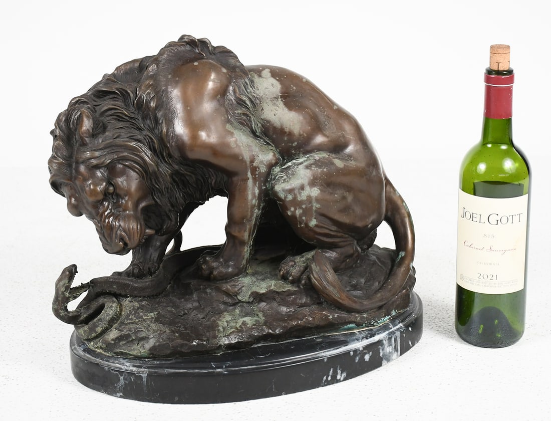 LION AND SERPENT BRONZE AFTER BAYRE: LION AND SERPENT BRONZE AFTER BAYRE: Measures 12.25" in height and 15.5" in width, overall 14" in height with rounded marble base, incised signature.