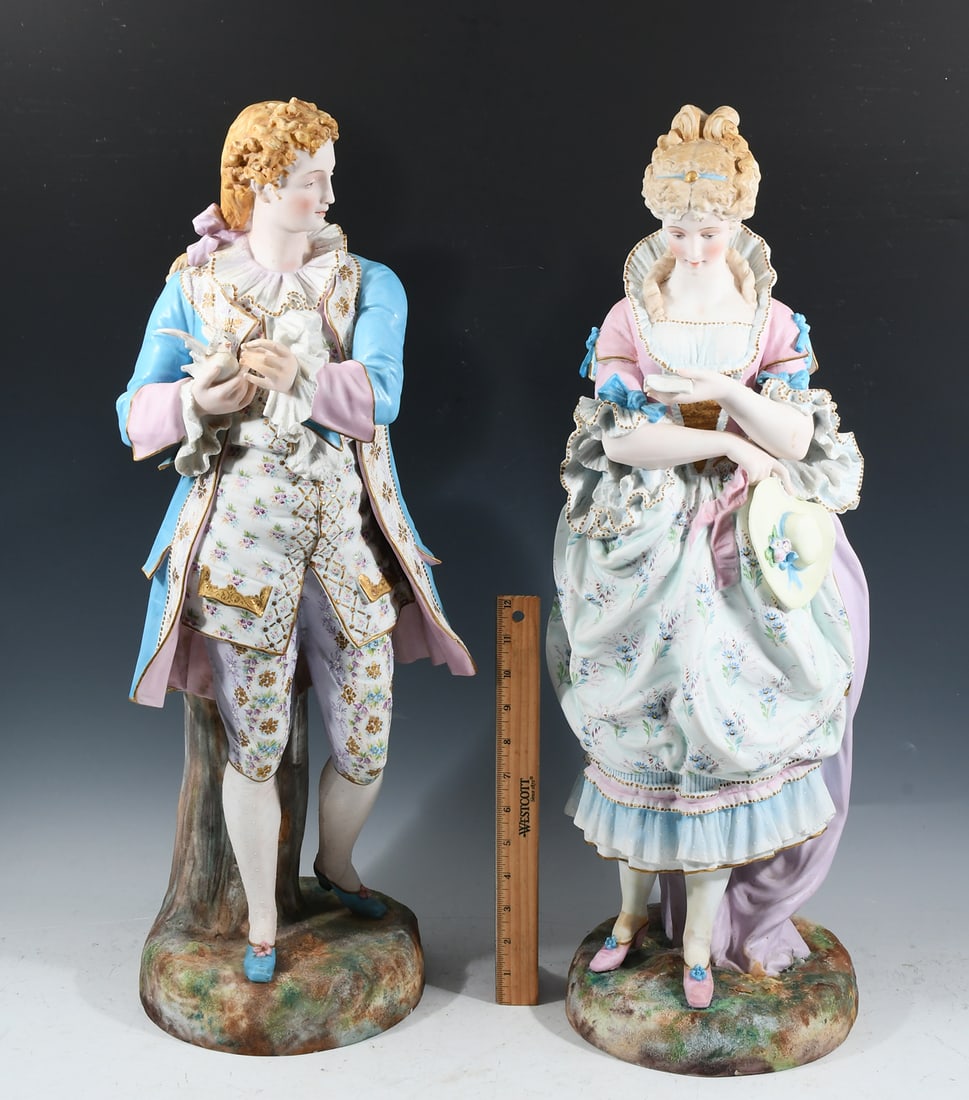 PAIR OF LARGE BISQUE FRENCH COLONIAL FIGURES: PAIR OF LARGE BISQUE FRENCH COLONIAL FIGURES: Late 19th century, beautiful pair of hand painted with exceptional quality detail, made in France. Approx. 25.75" h