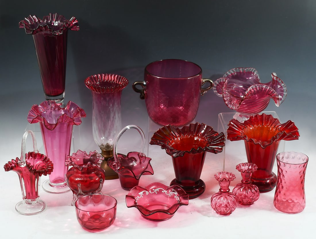 15 PC. CRANBERRY GLASS VASE, BASKET & BOWLS: 15 PC. CRANBERRY GLASS VASE, BASKET & BOWL COLLECTION: A 15 pc. Cranberry Art Glass collection. Including; Vases, Bowls, Footed Centerpieces, Candle stick, Bud Vases, & Baskets. Mostly Victorian, a fe