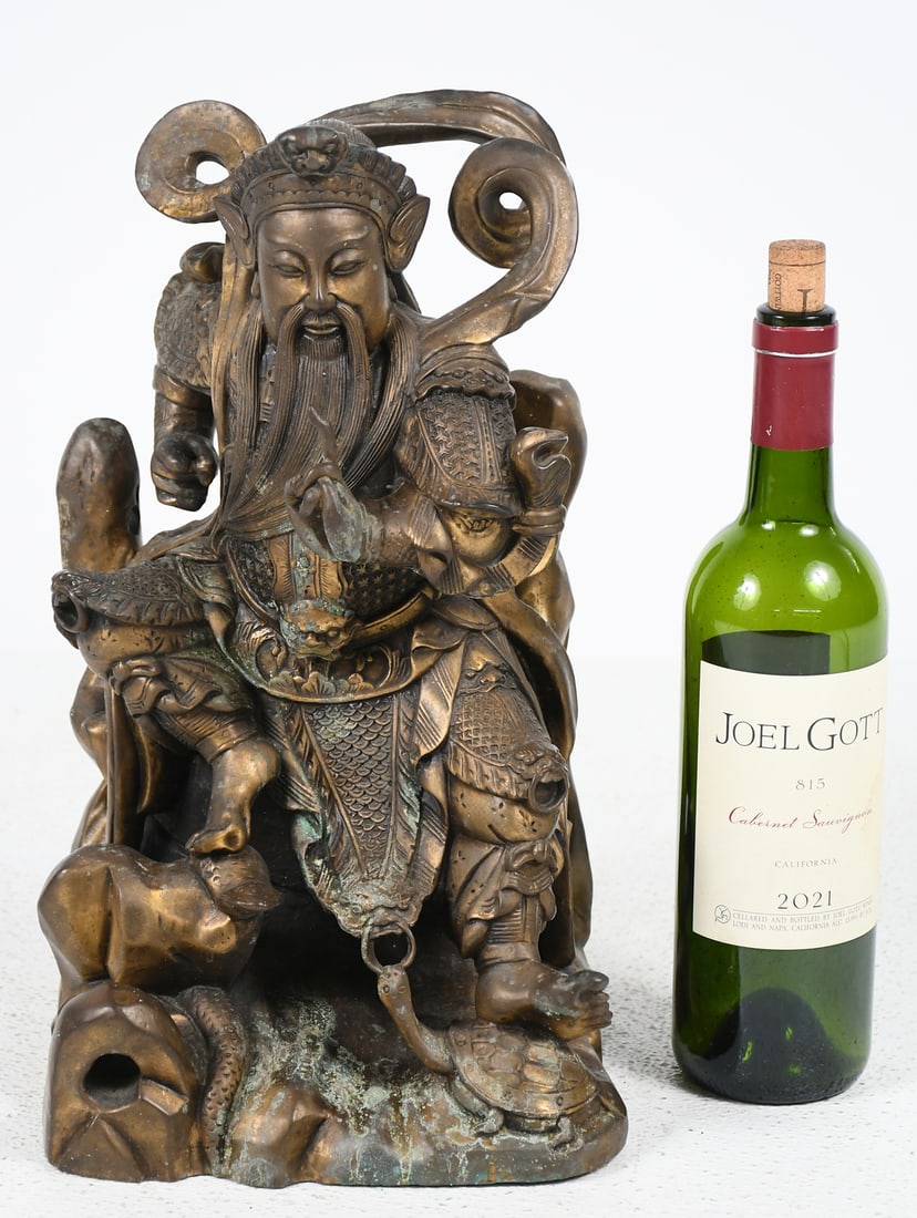 CHINESE ZHAO GONGMING PATINATED BRONZE: CHINESE ZHAO GONGMING PATINATED BRONZE: Depicts the Daoist God of Wealth seated with a turtle and snake nearby. Patinated Bronze, 15" in height.