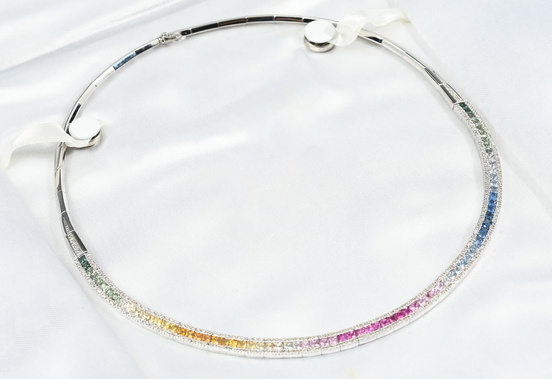 14K MULTISTONE NECKLACE: 14K MULTISTONE NECKLACE: One 17” long 14K white gold 3-row tapering bar link “Rainbow” necklace with a hidden box clasp and 2 figure-8 safety hooks. Center row contains seventy-eight (78