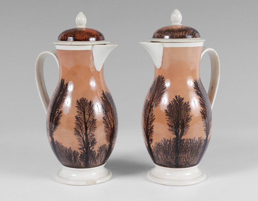 2 MOCHA SEAWEED PITCHERS: 2 SARREGUEMINES MOCHA WARE PITCHERS DECORATED IN THE SEAWEED PATTERN: Each with a lid. Measures 8 3/4" all inclusive. Impressed "Sareguemines".