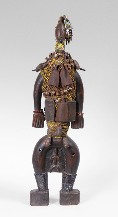 AFRICAN CARVED & BEADED NAMJI FERTILITY DOLL: AFRICAN CARVED & BEADED NAMJI FERTILITY DOLL: Carved and beaded fertility doll, Namji Tribe, Cameroon. Applied beads and metal scraps. 28 1/2'' h. x 7 3/4'' x 7''.