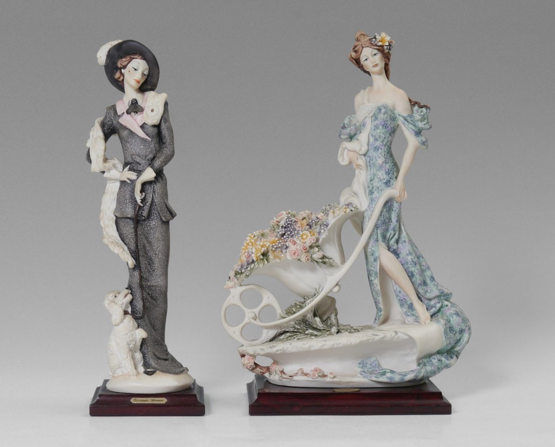2 GIUSEPPE ARMANI FLORENCE FIGURINES: 2 GIUSEPPE ARMANI FLORENCE SCULTURE d'ARTE FIGURINES: 1) "Flowers for Sale" #1119C, lovely colorful sculpture, approx. 14 1/4"h. x 9 3/4" x 5 1/4". 2) "Lady with Poodle" #0394C, 13 3/4"h. x 4" x 4 1/4