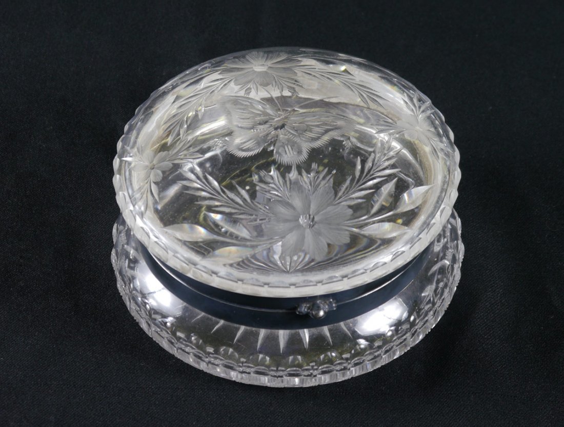 PAIRPOINT CUT GLASS BUTTERFLY DRESSER BOX: PAIRPOINT CUT GLASS BUTTERFLY POWDER OR DRESSER BOX: Butterfly and floral motif hinged lid, silverplate trim, cut glass base. Unsigned. Measures 3 1/4" h. x 6 1/8".