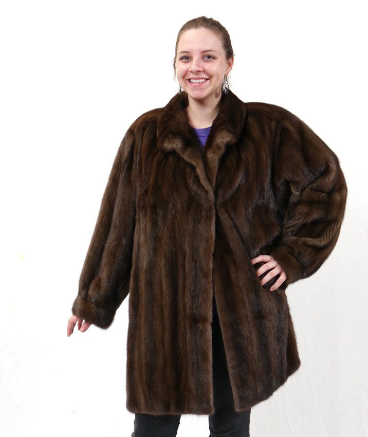 MINK FUR CAR COAT JACKET: CHOCOLATE MINK FUR COAT / JACKET: Car coat length in a comfy larger size. The full sleeves taper to a fitted cuff. Measures approx. 33" collar to hem, 22" shoulder to shoulder and 21" shoulder to cuff