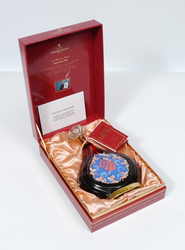 ERTE BOTTLE FOR COURVOISIER La Part Des Anges: ERTE BOTTLE FOR COURVOISIER La Part Des Anges: Created for famous cognac maker Courvoisier by Deco master Erte, sold unopened in original box and with paperwork, serial number L11984.