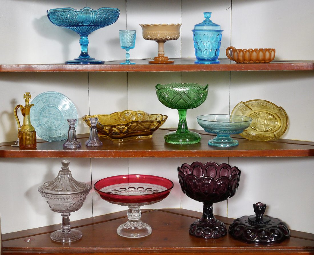 16 PC COLOR EAPG VICTORIAN GLASS: 16 PIECE GROUP OF EARLY EAPG AND VICTORIAN COLORED GLASS: Featuring the large purple Moon & Star covered compote (10.75"), amber Rivet cruet (6 3/4"), 2 Chocolate glass dishes, green compote, large ru