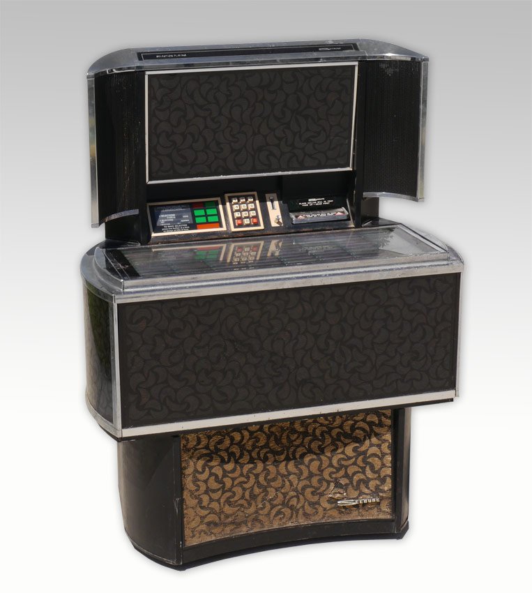 VINTAGE SEEBURG SPS2 MATADOR JUKEBOX: VINTAGE SEEBURG SPS2 MATADOR JUKEBOX: Circa 1972-73, holds 80 records for 160 selections total. Only produced for 2 years, cannot read serial number. Light up top and center section with speaker below