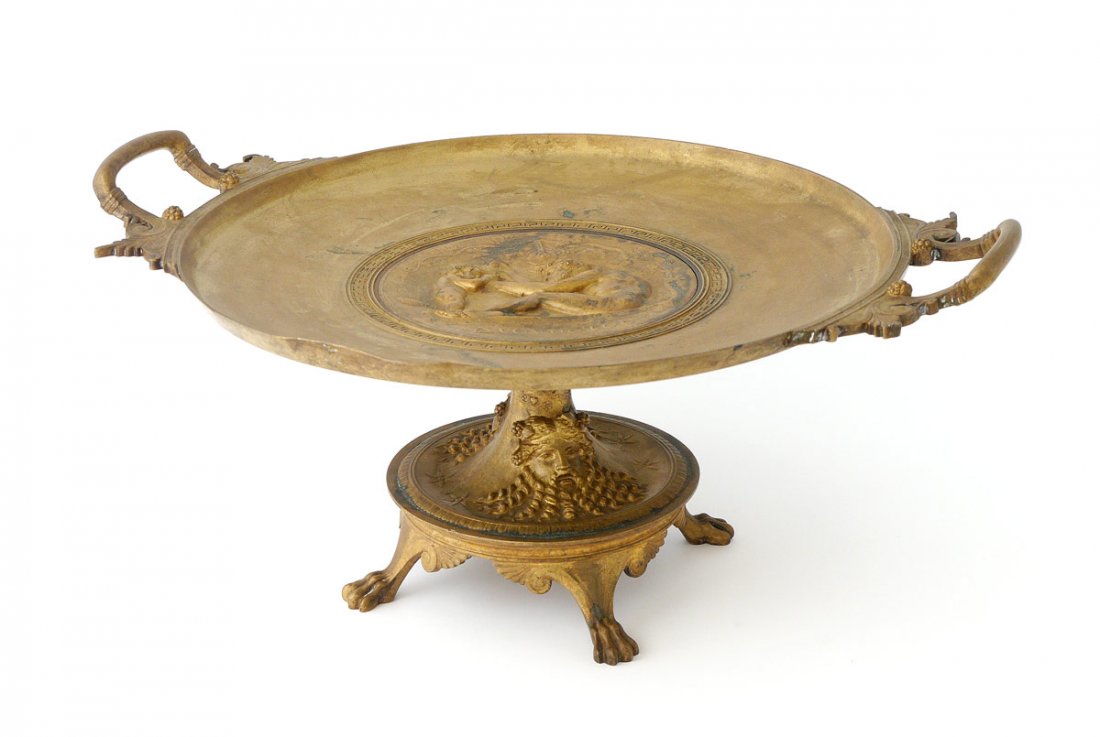 F. LEVILLAIN FRENCH BRONZE TAZZA: LEVILLAIN, Ferdinand, (French 1837-1905): Gilt Bronze tazza with central medallion depicting neo-classical Bacchus theme. Signed F. Levillain and dated 1866. Base with masquerons, on 4 paw feet. Measu