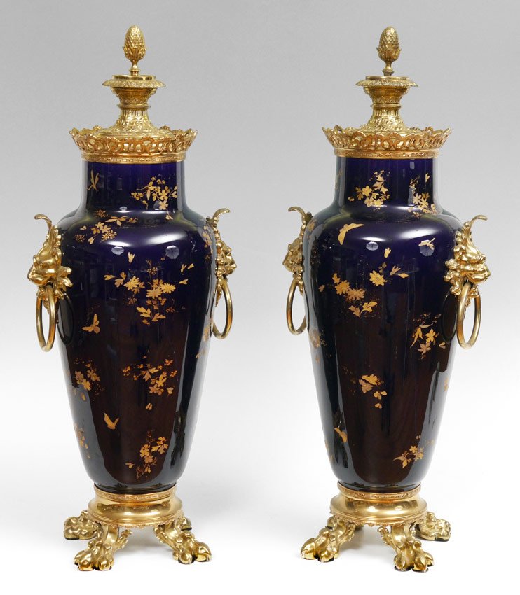 FRENCH SARREGUEMINES PORCELAIN OIL LAMPS /URNS 32'': MAGNIFICENT PR OF MONUMENTAL FRENCH SARREGUEMINES ORMOLU MOUNTED OIL LAMPS: Converted to covered urns retaining the original oil fonts. These late 19th century metal mounted ovoid form urns are decora