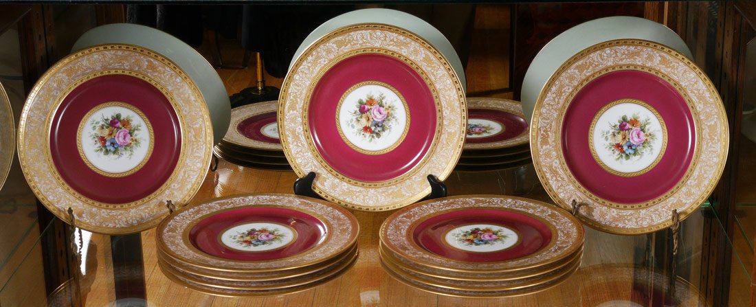 HEINRICH & CO GOLD DECOR SERVICE PLATES 11 PC: SET OF 11 HEINRICH & CO SERVICE PLATES: Gold decorated rim centering a floral center. Bavarian fine china. 10 7/8'' dia.