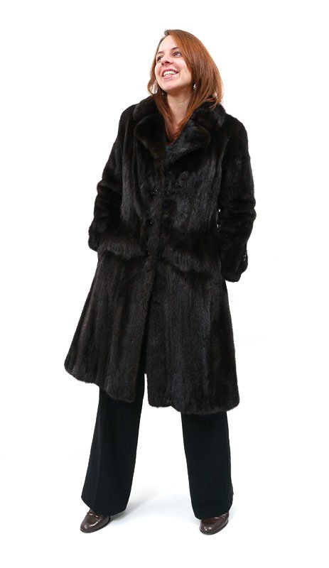 FULL LENGTH MINK FUR COAT: FULL LENGTH MINK FUR COAT: Lustrous dark brown coat, generous collar, button front, decorative strap and button on the cuff. Size 6 small. Measures approx. 41" collar to hem, 18" shoulder to shoulder,