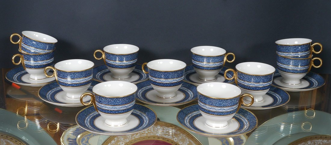 THEODORE HAVILAND DEMI-TASSE CUPS AND SAUCERS: SET OF 8 THEODORE HAVILAND DEMI-TASS CUPS AND SAUCERS: 11 cups and 9 saucers. Theodore Haviland New York.