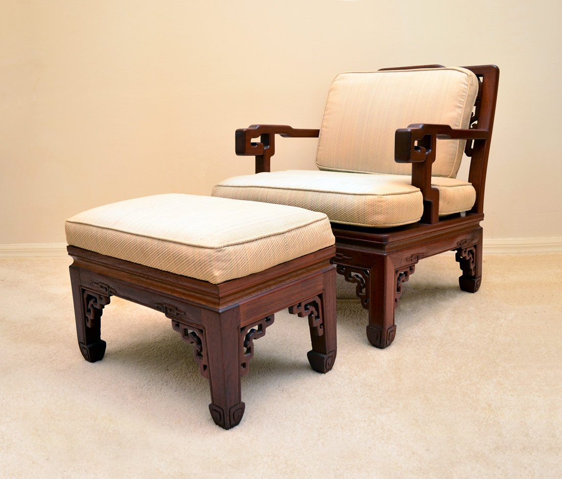 KOREAN ARM CHAIR WITH OTTOMAN: KOREAN ARM CHAIR WITH OTTOMAN: Carved and shaped frame with patterned upholstery. Chair 29 1/4" h. x 24 1/2" x 27 1/2", ottoman 15" x 22" x 15".