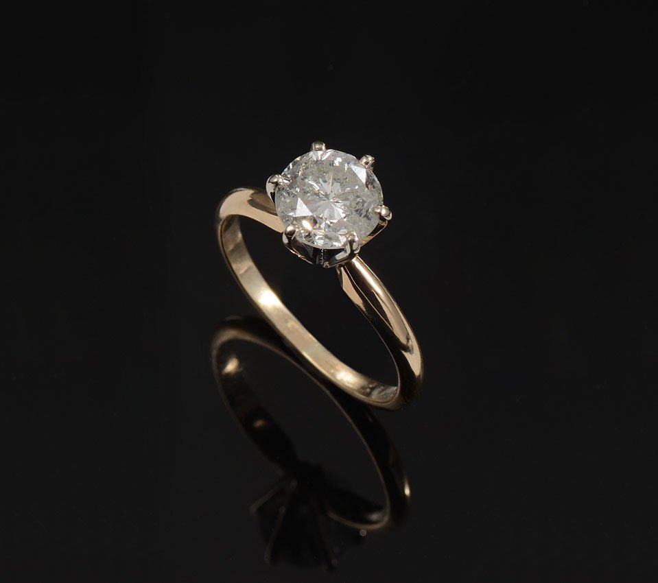 1.40 CT DIAMOND SOLITAIRE ENGAGEMENT RING SZ 4.75: 1.40 CT DIAMOND SOLITAIRE ENGAGEMENT RING: 14K yellow gold solitaire ring contains one round brilliant cut diamond. WEIGHT: 1.40 Ct. Approx. Rated I2 in clarity and H in color. The diamond is prong se