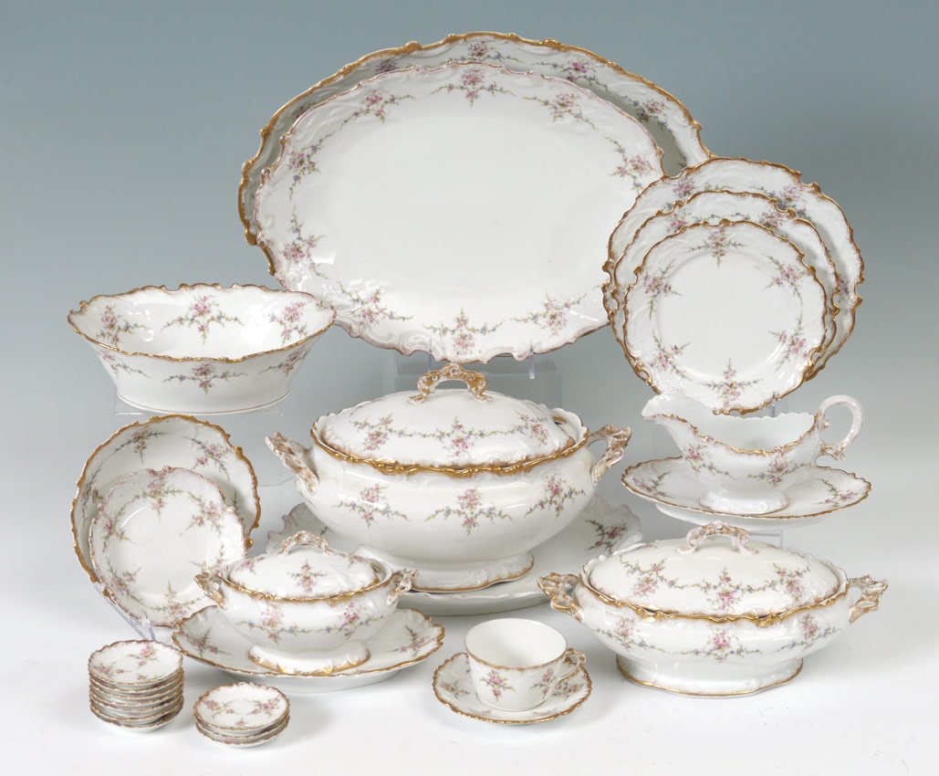 90 PC ANTIQUE FRENCH LIMOGES CHINA SERVICE W/TUREEN: FINE FRENCH LIMOGES CHINA SERVICE: Laviolette, Ca. 1896-1905. Ornate gold rim china decorated in flowers and garland. Approx. 90 pieces to include 12 dinner plates (9 1/2"). 10 plates (8 1/2"0, 13 pla