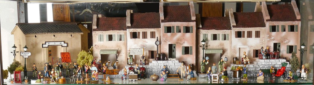 AN ASSEMBLED COLLECTION OF KING & COUNTRY FIGURES:: AN ASSEMBLED COLLECTION OF KING & COUNTRY FIGURES: Approx. 40 figures, plus accessories, background plants and buildings. Assembled from different collections including Silk Road and Streets of Hong K