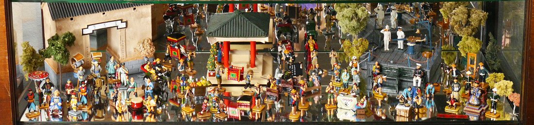 AN ASSEMBLED COLLECTION OF KING & COUNTRY FIGURES: AN ASSEMBLED COLLECTION OF KING & COUNTRY FIGURES: Approx. 66 figures, plus accessories, background plants and buildings. Assembled from different collections including Silk Road and Streets of Hong K