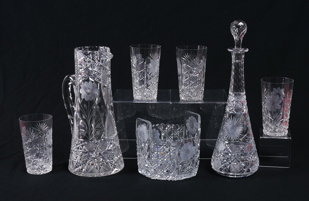 7 PIECE CUT GLASS ATTRIBUTED TO PAIRPOINT: 7 PIECE CUT GLASS ATTRIBUTED TO PAIRPOINT: Pitcher (12" h. x 5 1/2"), tumblers (5 1/2), decanter with stopper (14 3/4" h. x 5") & ice bucket (5 1/2" x 5 3/4").