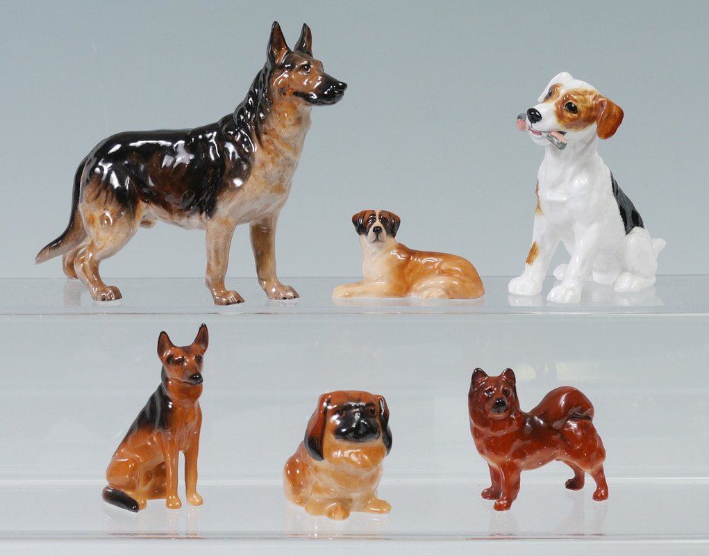 LOT OF 6 ROYAL DOULTON DOGS TO INCLUDE: LOT OF 6 ROYAL DOULTON DOGS TO INCLUDE: German Shepherd HN 1117; St Bernard Lying, K19; Character Dog with Bone, HN 1159; Alsatian Seated Style 1 K13; 3) Pekinese Seated, K6; Child (Shiba Inu), K15.