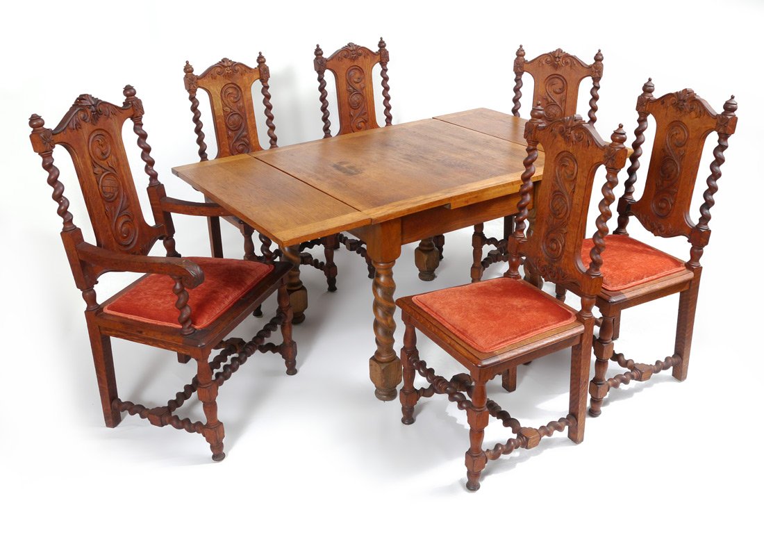 CARVED OAK DRAW LEAF DINING TABLE WITH CHAIRS: CARVED OAK DRAW LEAF DINING TABLE WITH CHAIRS: Oak table with barley twist legs measures 39 3/4" h. x 36 "x 36", each draw leaf 12". Sold with 6 chairs, carved back with Northwind masquerons and folia