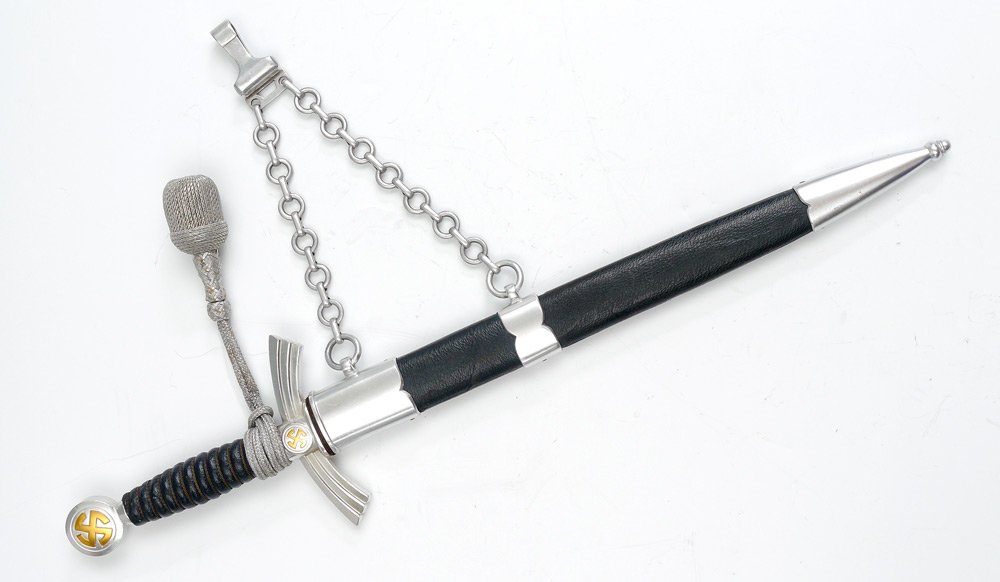 LUNESCHLOSS WWII GERMAN LUFTWAFFE DAGGER: LUNESCHLOSS WWII GERMAN LUFTWAFFE DAGGER: First model dagger with aluminum mounts, leather wrap grip. 12 1/4'' blade marked P. D. Luneschloss, Solingen. Leather wrapped scabbard. Original chain hanger