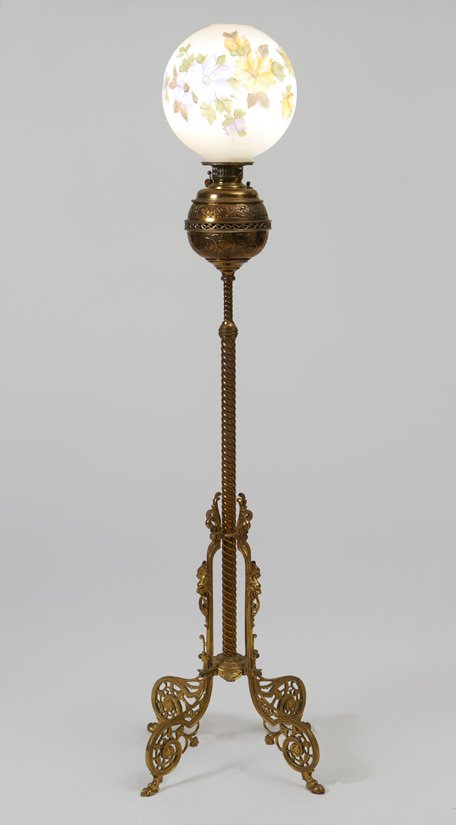 VICTORIAN ERA FLOOR LAMP - OIL TO ELECTRIC: VICTORIAN PIANO FLOOR LAMP: Ornate brass base with hand painted globe shade. Electrified. Measures 52", the shade adds an additional 11".