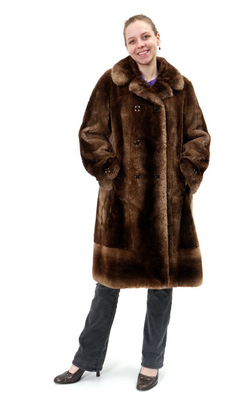 BEAVER FUR COAT:: BEAVER FUR COAT: Dense beaver fur coat with lapel collar, original vintage buttons on front and cuffs. Measures approx. 38" l. collar to hem. Size S-M.