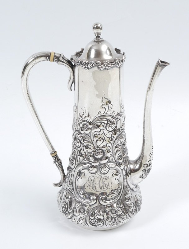 MAUSER FLORAL REPOUSSE STERLING CHOCOLATE POT: MAUSER FLORAL REPOUSSE STERLING CHOCOLATE POT: Hinged lid, foliate scroll rim, body with repousse floral motif, monogrammed in medallion. Marked on base 1719, Mauser hallmark, Sterling-Silver, 925/100