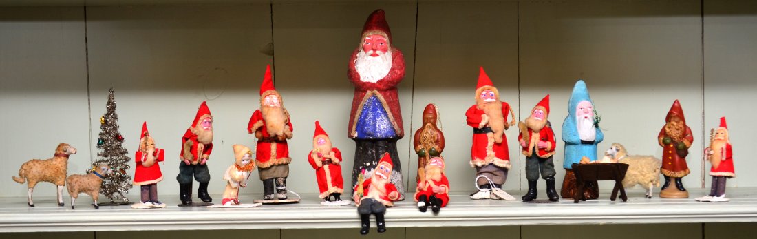 14 OLD VINTAGE SANTA CLAUS plus: 14 VINTAGE SANTA CLAUS FIGURES: Straight from the estate! The largest being the 9 1/2" paper mache and gesso hollow body Santa, his underside stamped "Germany". There are 10 Santas in felt suits, with