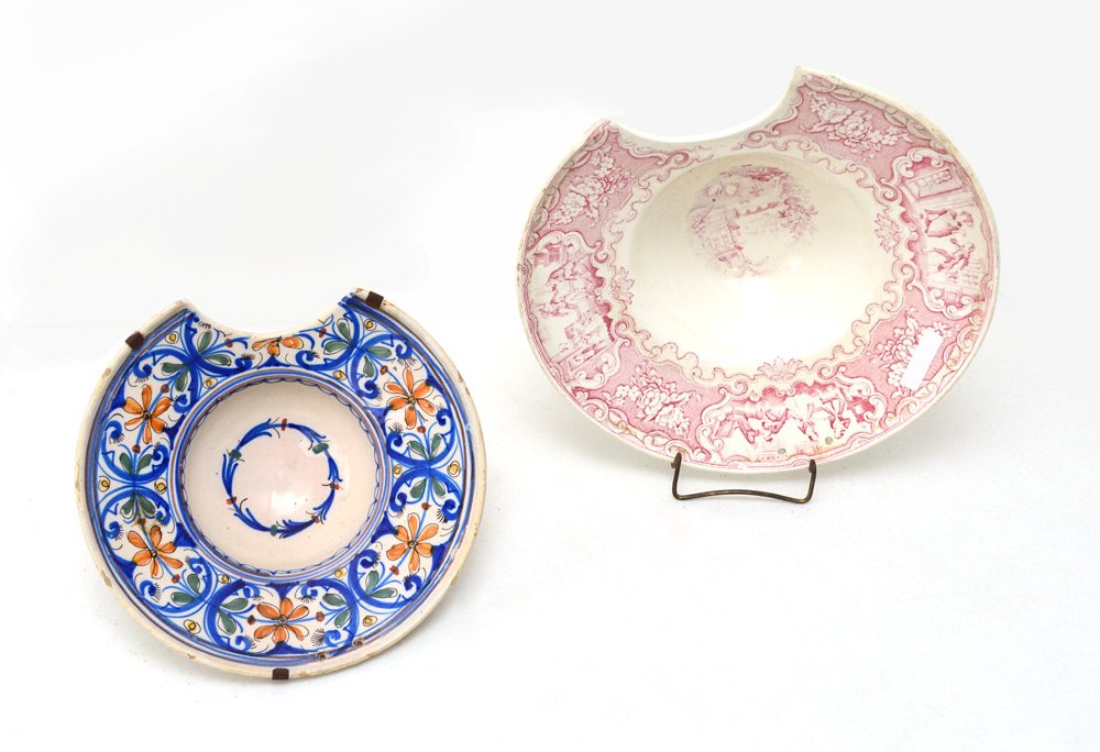 2 CONTINENTAL SHAVING BOWLS: 2 CONTINENTAL SHAVING BOWLS: To include 1) Pickmanyo Sevilla transferware with genre scenes and floral decoration. Marked on base, 4" h. x 12" dia. 2) Continental faience with foliate decoration, meta