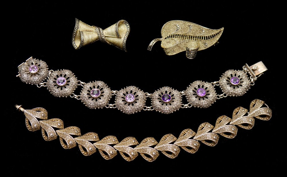 THEODORE FAHRNER STERLING JEWELRY 4 PIECE: SIGNED THEODORE FAHRNER STERLING JEWELRY: 4 pieces of art jewelry to include 2 bracelets (7" )and 2 pins. Late 19th - early 20th century. All pieces are signed. Approx. 24.2 troy oz.