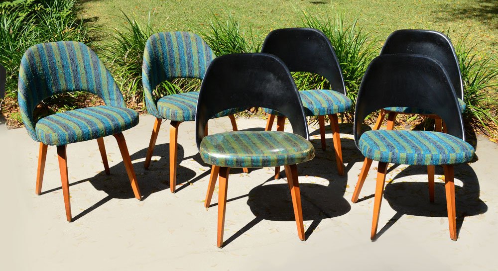 6 EERO SAARINEN FOR KNOLL EXECUTIVE CHAIRS: 6 EERO SAARINEN FOR KNOLL EXECUTIVE CHAIRS: All with original multi color fabric seats, one with plastic cover, 2 with fabric backs, other hard plastic backs. Wood legs, designed by Eero Saarinen for 