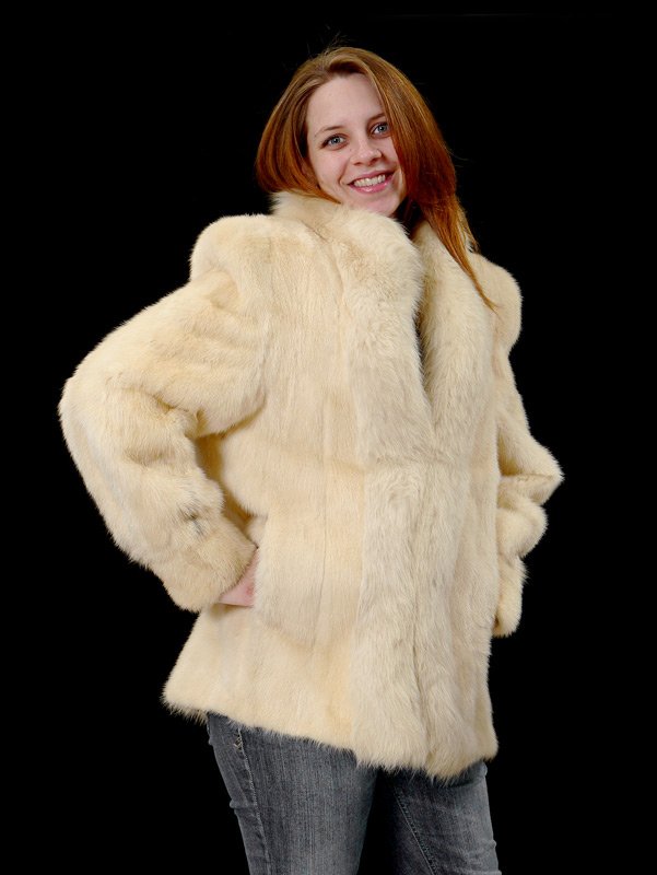 WHITE MINK FUR JACKET: WHITE MINK FUR JACKET: Full collar continues to the hem, slit pockets, wide fitted cuffs. Billie Jaye for Williams Fur Group, Toronto Canada. Measures approx. 27" collar to hem, 20" shoulder to should