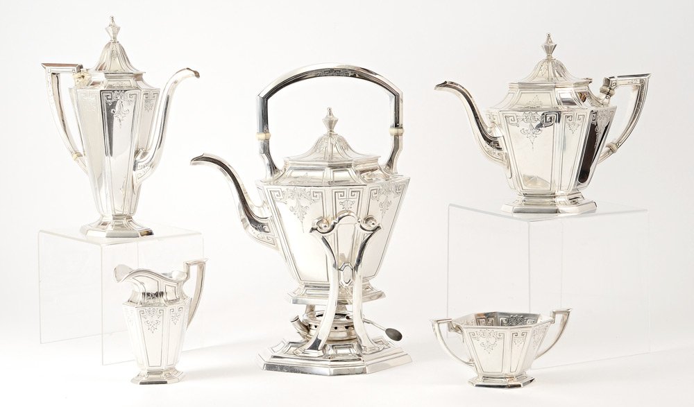5 PIECE 1915 GORHAM STERLING TEA SERVICE: 5 PIECE 1915 GORHAM STERLING TEA SERVICE: 5 pieces with engraved paneled sides to include 1) Hot water kettle with hinged lid, removable from stand with articulated burner opening, #A9706. Overall 12 