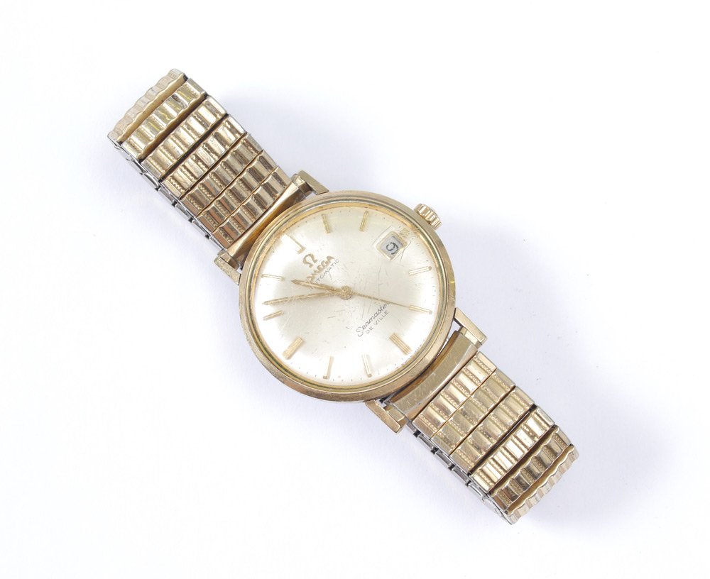 OMEGA SEAMASTER DE VILLE WRIST WATCH: OMEGA SEAMASTER DE VILLE WRISTWATCH: Gold filled and stainless watch with Speidel band. Automatic with date, bar markers on the dial.