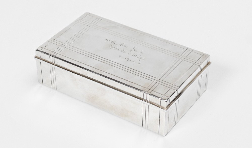 TIFFANY & CO STERLING PRESENTATION BOX: TIFFANY & CO STERLING PRESENTATION BOX: Box with hinged lid, wood lined interior. Family tradition holds this box was presented to John Jacob Astor II from Brenda Frazier & Shipwreck Kelly, engraved o