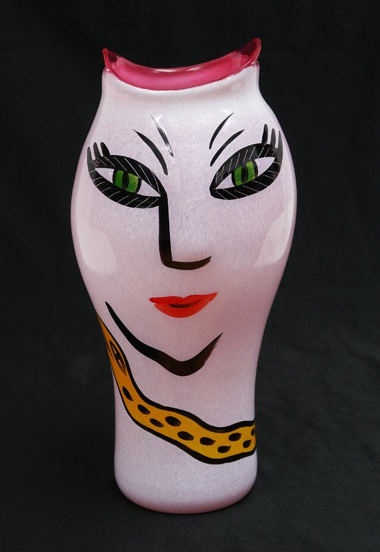 ULRICA HYDMAN-VALLIEN FOR KOSTA BODA VASE: ULRICA HYDMAN-VALLIEN FOR KOSTA BODA VASE: From her successful "Open Minds" collection, pink glass hand decorated with cat like face and snake. Original clear labels on back, signed. Overall measures 
