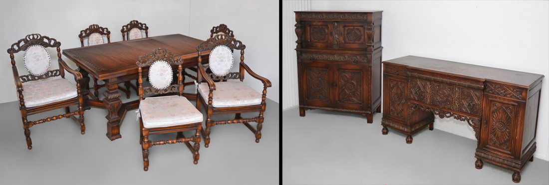 CARVED 10 PC DINING SUITE: JACOBEAN STYLE CARVED OAK DINING SUITE: 10 piece to include, TABLE with 18'' draw leaf to each end, double Y stretcher attached to carved legs, overall 30''h. x 68.5'' x 41''; 6 CHAIRS each with a cro
