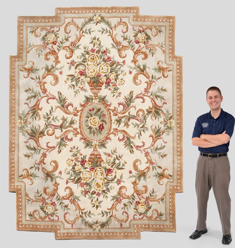 30 YR OLD INDO-AUBUSSON H K WOOL RUG 7'8''x9'6'': APPROX. 25-45 YR. OLD INDO-AUBUSSON HAND KNOTTED WOOL RUG, 7'8'' x 9'6'': This rug has a soft palette of greens, ivory, pink, and beige with accents of brown and cranberry. The central oval shaped med